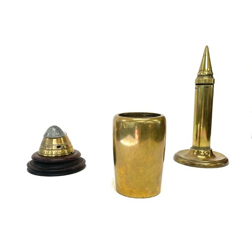 65 - Selection of trench art to include a money box, vase, WW1 fuse cap no 80.