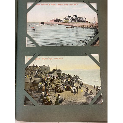 86 - Vintage postcard album with contents