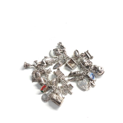 355 - Vintage silver charm bracelet weight 55g