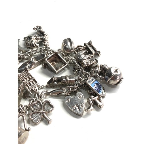 355 - Vintage silver charm bracelet weight 55g