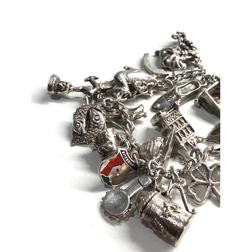 355 - Vintage silver charm bracelet weight 55g