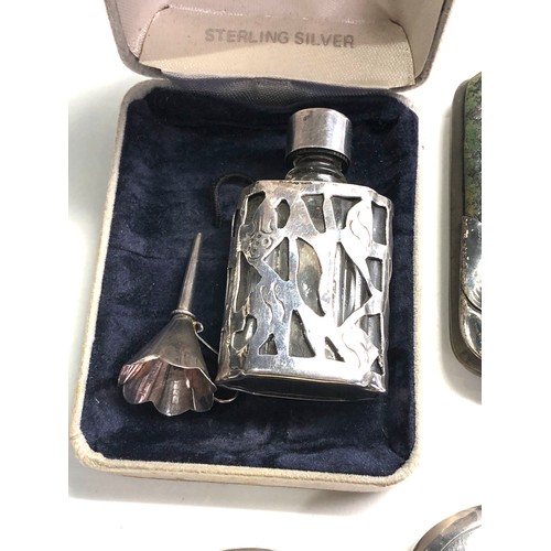 85 - Selection of silver items includes scent bottles small enamel mirror etc