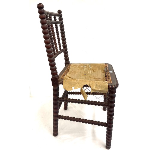 489 - Mahogany bobbin and wicker bedroom chair in need of restoration