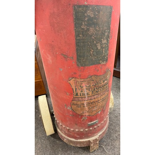 100D - Vintage fire extinguisher on wheels, approximate height: 38 inches, width 15 inches