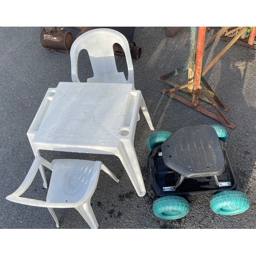 100U - Childrens plastic table and 2 chairs, gardening seat on wheels