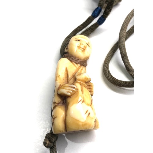 488 - Antique ivory netsuke on original cord