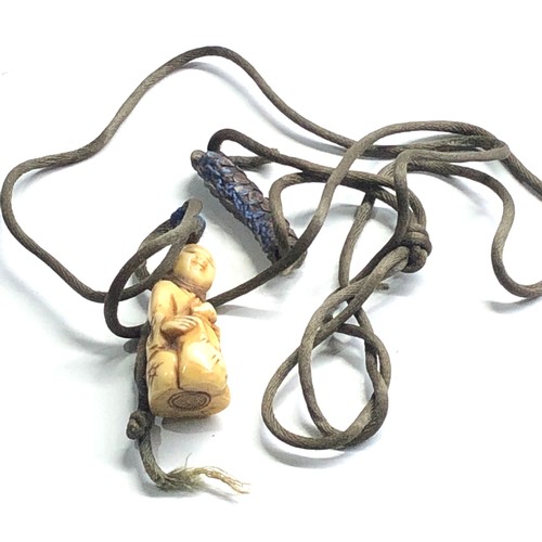 488 - Antique ivory netsuke on original cord