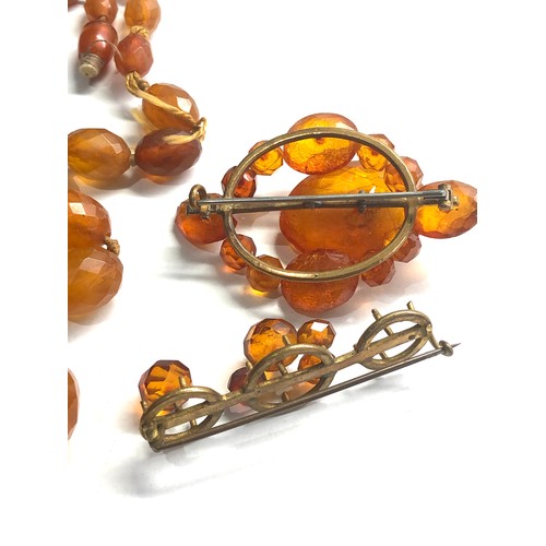 386 - Selection of antique amber jewellery items some in need of repair