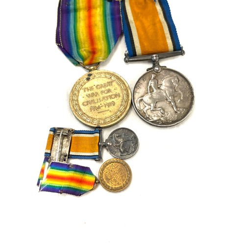 435 - WW1 British War/Victory Medal issued to 185891 PTE 1 A T DAVIES R.A.F, together with WW1 miniature s... 