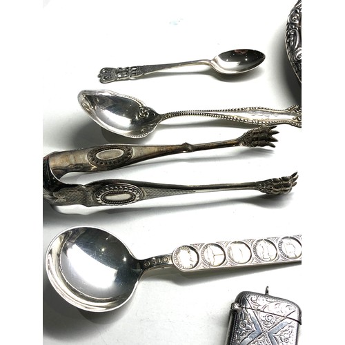 70 - Selection of silver items includes french silver sugar tongs mirror vesta case etc