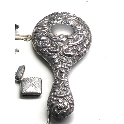 70 - Selection of silver items includes french silver sugar tongs mirror vesta case etc