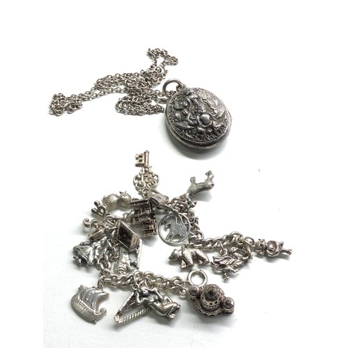 72 - Vintage silver charm bracelet locket & chain weight 83g