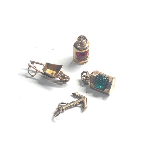 312 - 4 vintage 9ct gold charms 4.7g