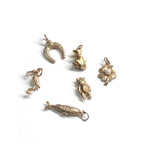 306 - Selection of 9ct gold charms 5.4g