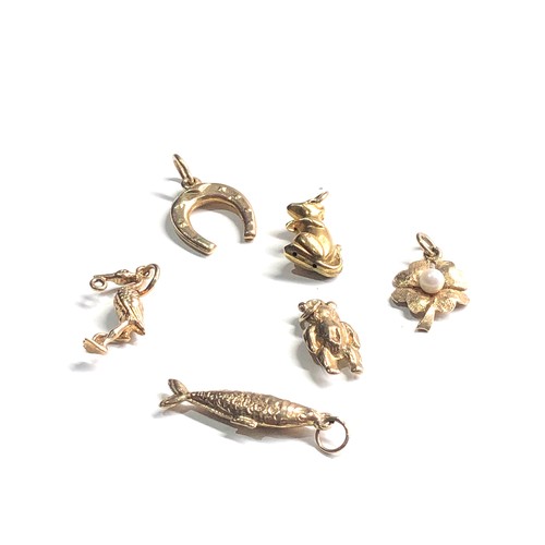 306 - Selection of 9ct gold charms 5.4g