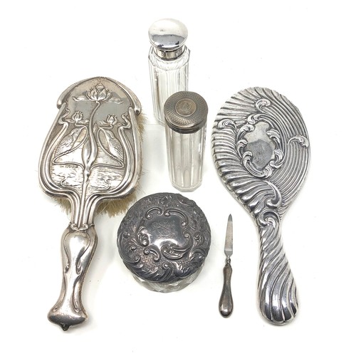 86 - Selection of silver items silver top jars brushes & mirror etc