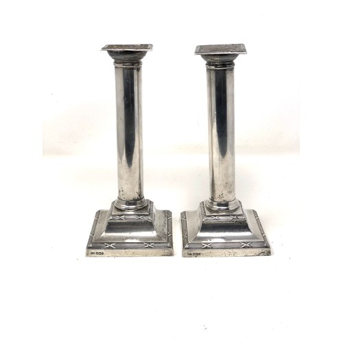 74 - Pair of antique silver candlesticks measure approx 23cm tall sheffield silver hallmarks filled bases... 