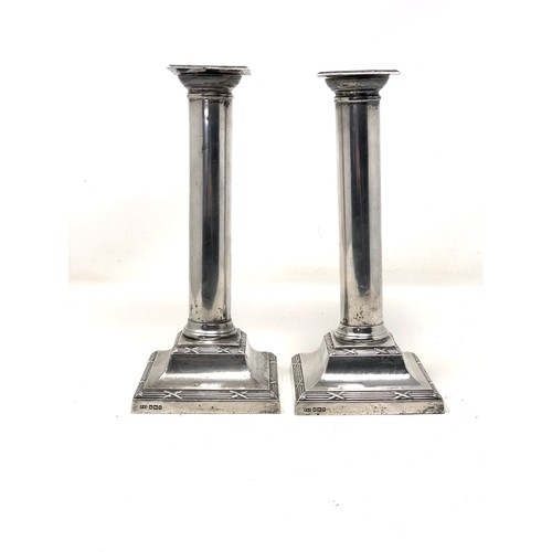 74 - Pair of antique silver candlesticks measure approx 23cm tall sheffield silver hallmarks filled bases... 