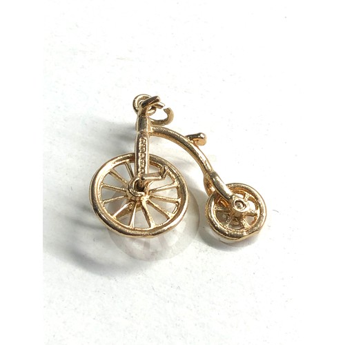 106 - 9ct gold penny farthing charm weight 2.6g