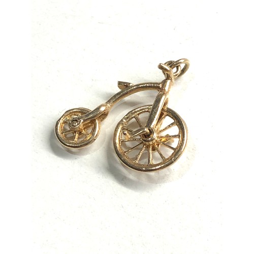 106 - 9ct gold penny farthing charm weight 2.6g