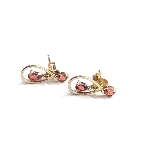 96 - 9ct gold garnet earrings weight 1.2g