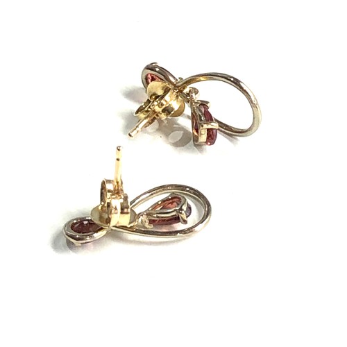 96 - 9ct gold garnet earrings weight 1.2g