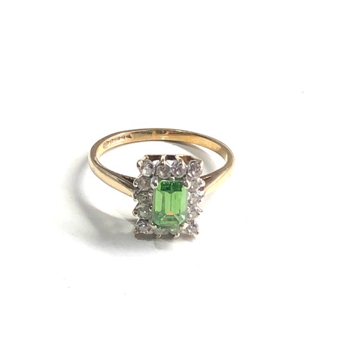 104 - 9ct gold green stone ring weight 2.2g