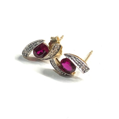 97 - 9ct gold synthetic ruby & diamond earrings weight 1.5g