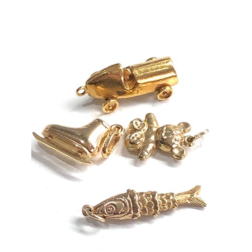 102 - 4 x 9ct gold charms 5.9g