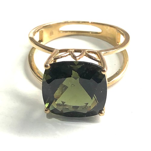 122 - 9ct gold moldavite ring weight 3.6g coa