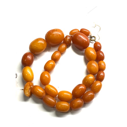 334 - Egg yolk amber bead necklace & earrings chips to amber total weight 47g