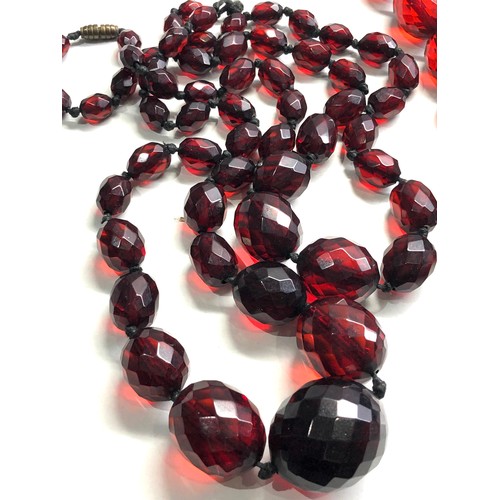 333 - 2 prystal bakelite bead necklaces weight 93g