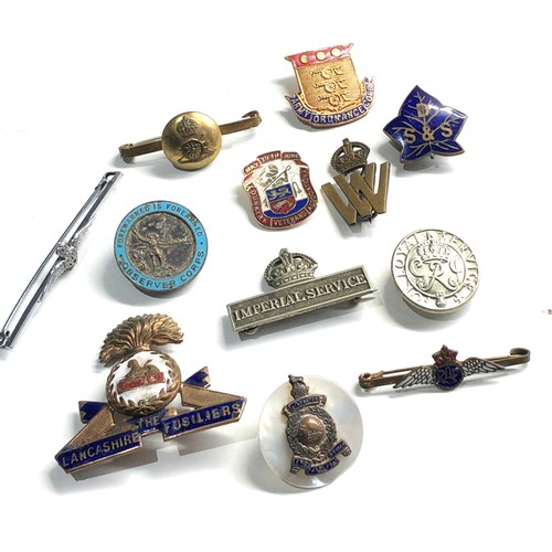 405 - 12 military badges includes sweetheart etc