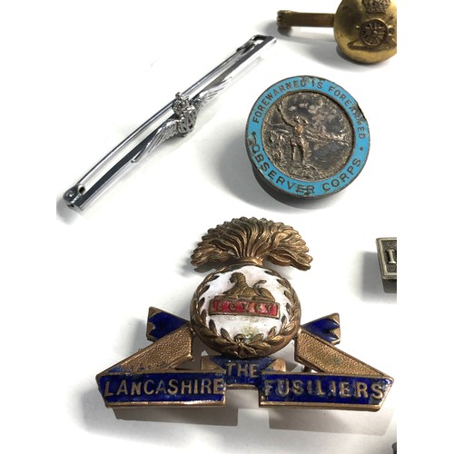 405 - 12 military badges includes sweetheart etc