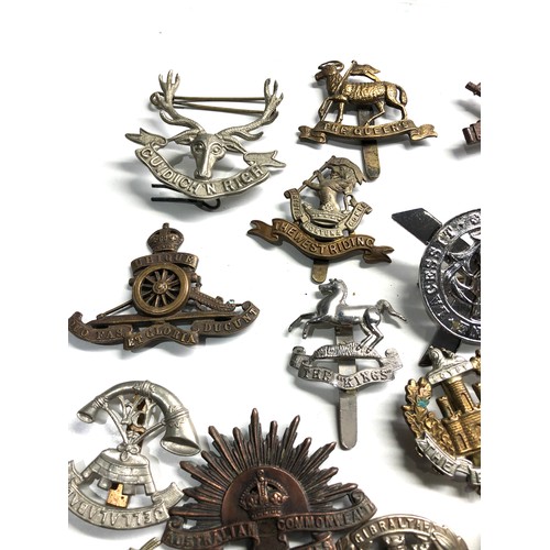 389 - 20 military cap badges