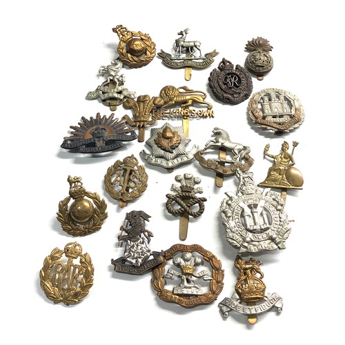 409 - 20 military cap badges