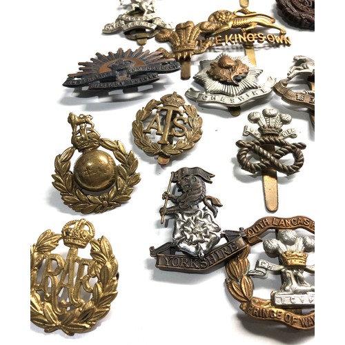 409 - 20 military cap badges