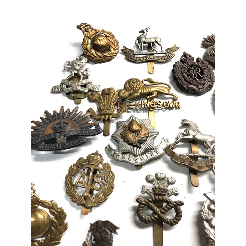 409 - 20 military cap badges