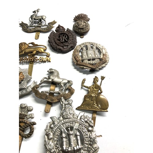 409 - 20 military cap badges