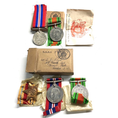 383 - 2 boxed ww2 medal groups