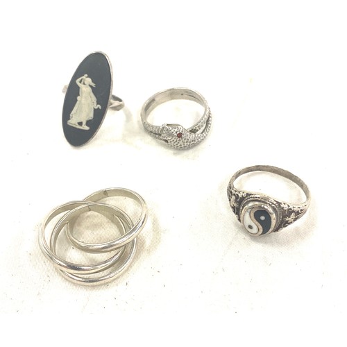 460 - Four silver rings includes snake ring, Jasperware ring etc weight approx 22.5g