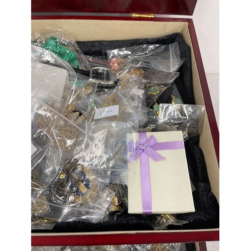 498 - Large selection of assorted costume jewellery and jewellery case