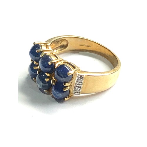 444 - 9ct gold diamond & cabochon sapphire ring weight 3.5g