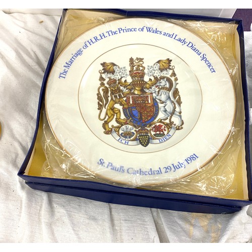 34 - Selection of commemorative ware to include books, plates, bell etc