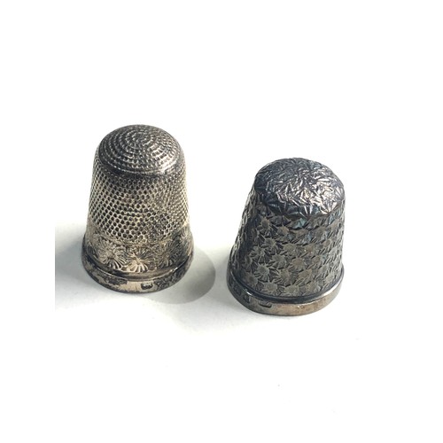 65 - 5 sterling silver buttons & 2 silver thimbles