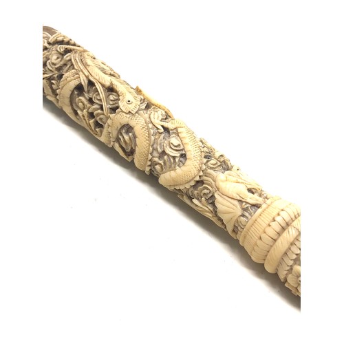 420 - Antique Chinese carved ivory handle measures approx 29cm long filled repairs