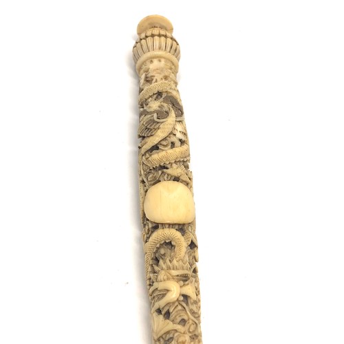 420 - Antique Chinese carved ivory handle measures approx 29cm long filled repairs