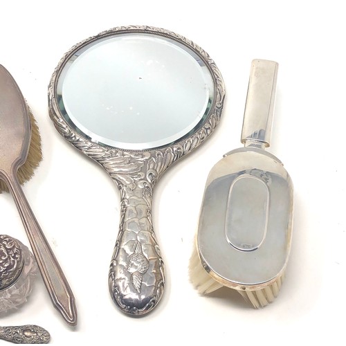 22 - Selection of silver items includes mirror brushes scent bottles etc