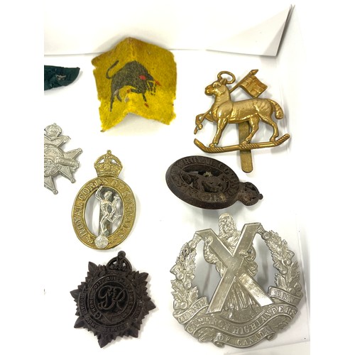 479 - Selection of cap badges