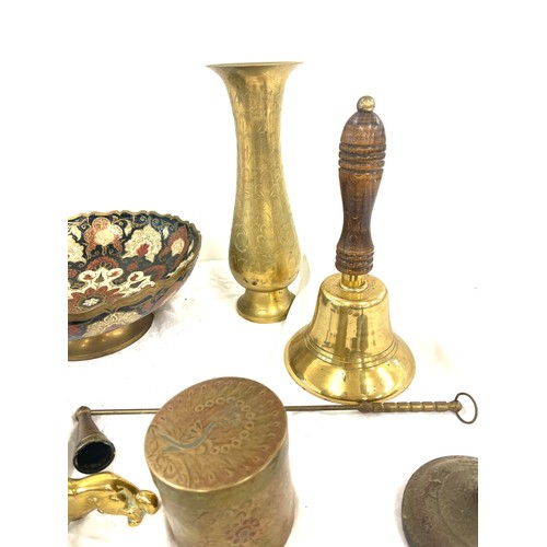 86 - Selection of brassware to include bowl with pedestal stand, bell, vase etc